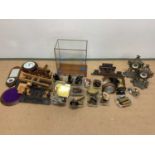 A quantity of wall and mantel clock parts for spares and repairs