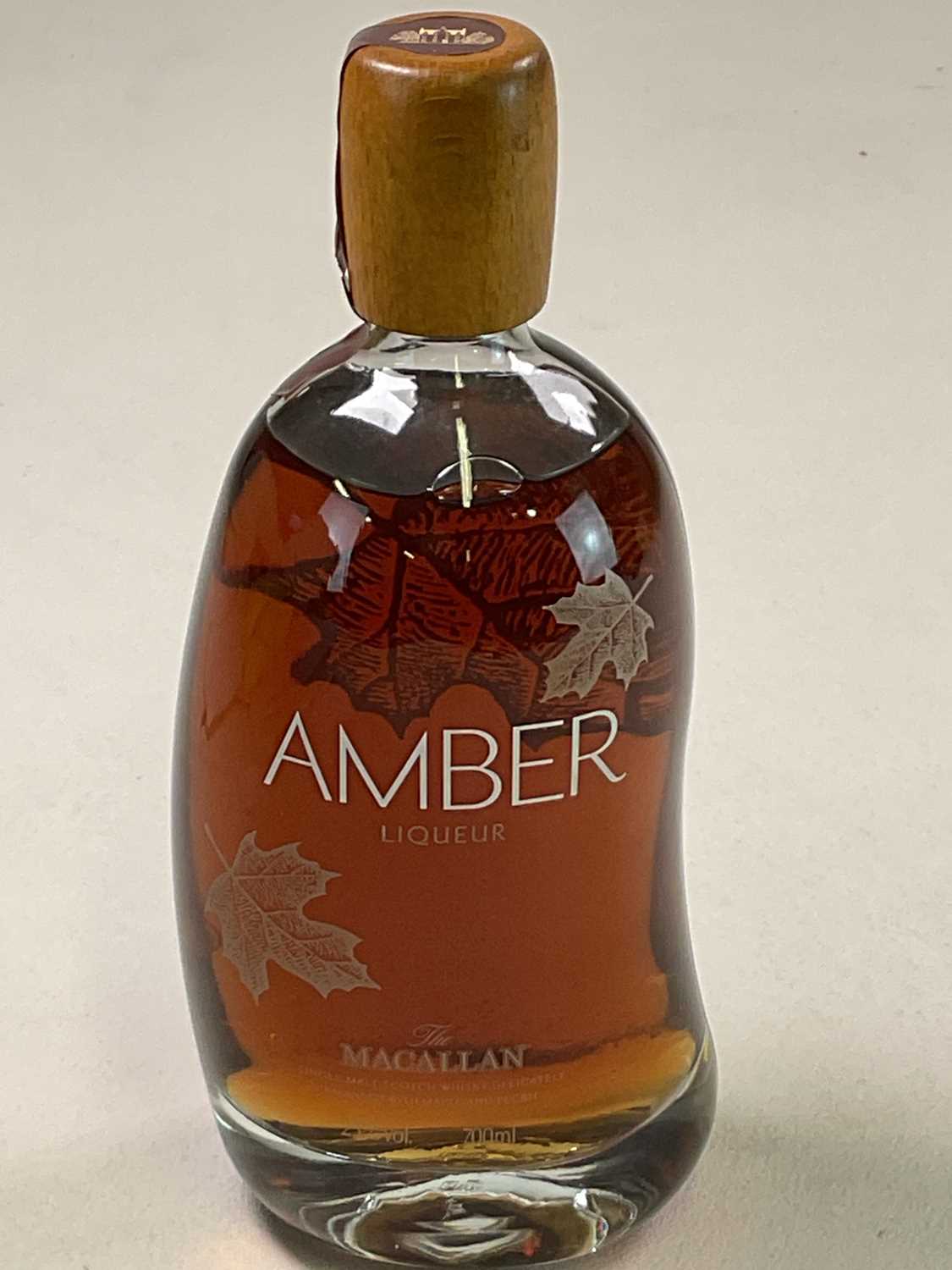 LIQUEUR; a bottle of The Macallan Amber liqueur, Single Malt Scotch whisky balanced with maple and