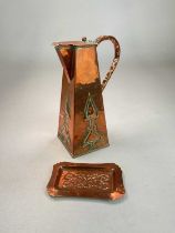 An Arts and Crafts copper water jug with tapered body embossed with stylized plants, height 28cm,
