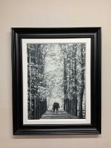 † C ROGERS; a signed limited edition print, figures strolling through a tree lined avenue,