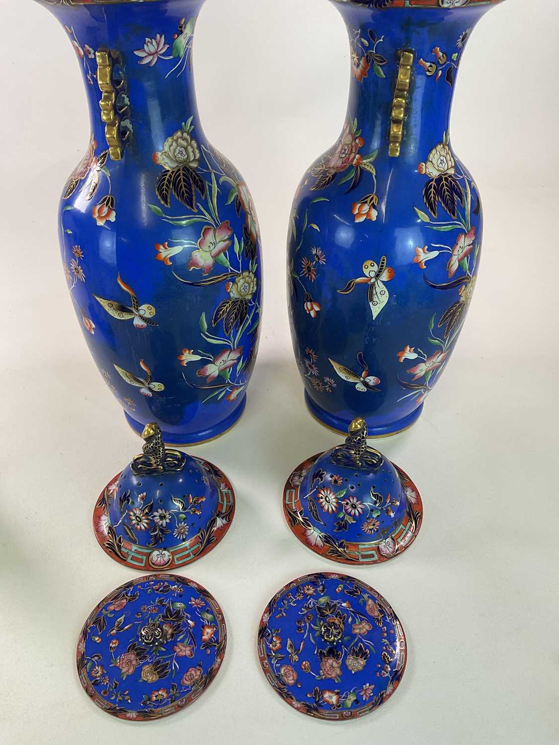 A very large pair of mid 19th century blue ground vases in the Chinoiserie style with stylised - Image 7 of 7