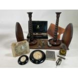 A group of collectors' items including a book slide, artist's tin, Black Forest bear, a pair of