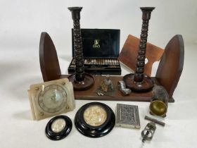 A group of collectors' items including a book slide, artist's tin, Black Forest bear, a pair of
