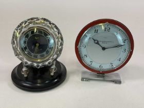 An Art Deco clock by Pleasance & Harper Ltd on chrome base, height 21cm, and a Russian glass clock
