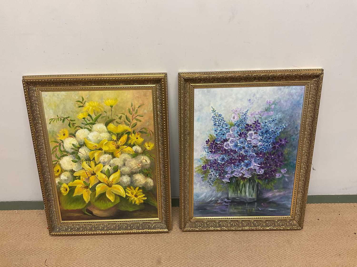 † JOAN CAWLEY (1925-2015); two oils on canvas, 'Yellow Lilies, Carnations and Yellow Daisies', and a