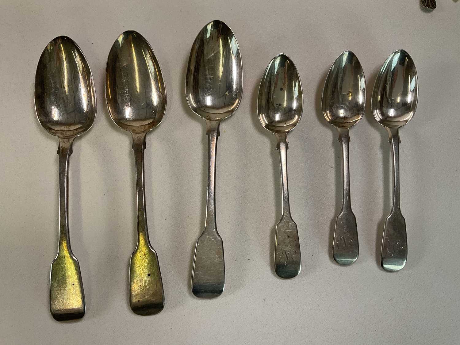 WILLIAM ELEY; a set of three George IV hallmarked silver fiddle pattern tablespoons, a matched set - Image 11 of 12