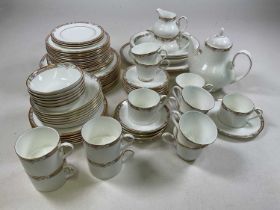 ROYAL DOULTON; a 'Hardwick' dinner/tea service to include plates, side plates, dishes, tea and