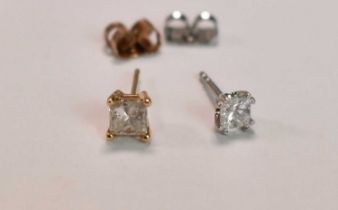 Two single diamond ear studs, both princess cut, one weighing approx 0.33ct, one weighing approx 0.