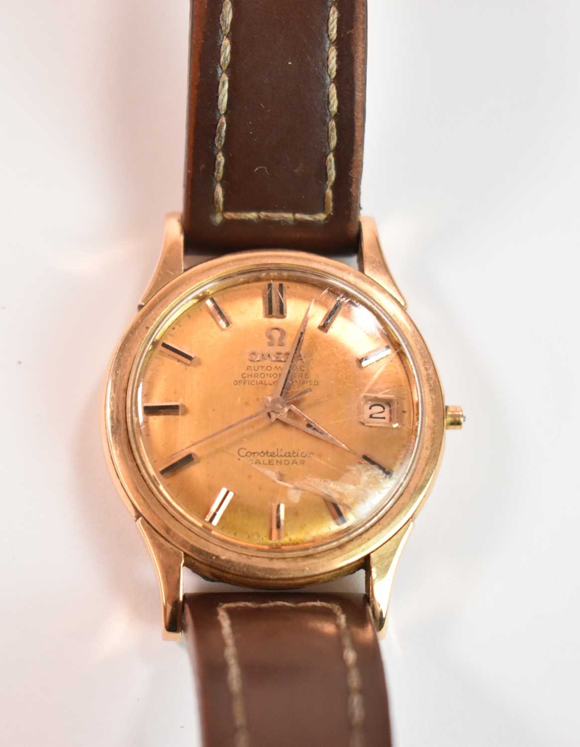 OMEGA; a gentleman's 18ct yellow gold Constellation Calendar vintage wristwatch with baton markers