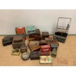 A large collection of vintage tins, wooden boxes and other items