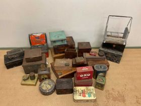 A large collection of vintage tins, wooden boxes and other items