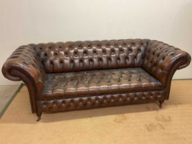 A mid 20th century brown leather button back Chesterfield sofa, height 80cm, width 220cm, depth