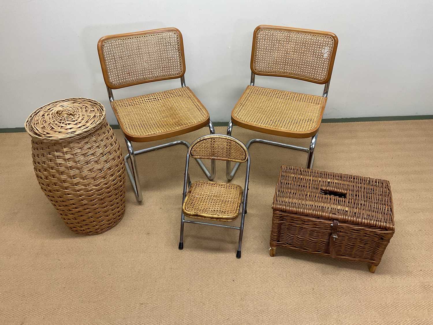 Pair of chrome and rattan chairs, a child's folding rattan chair and various wicker items.
