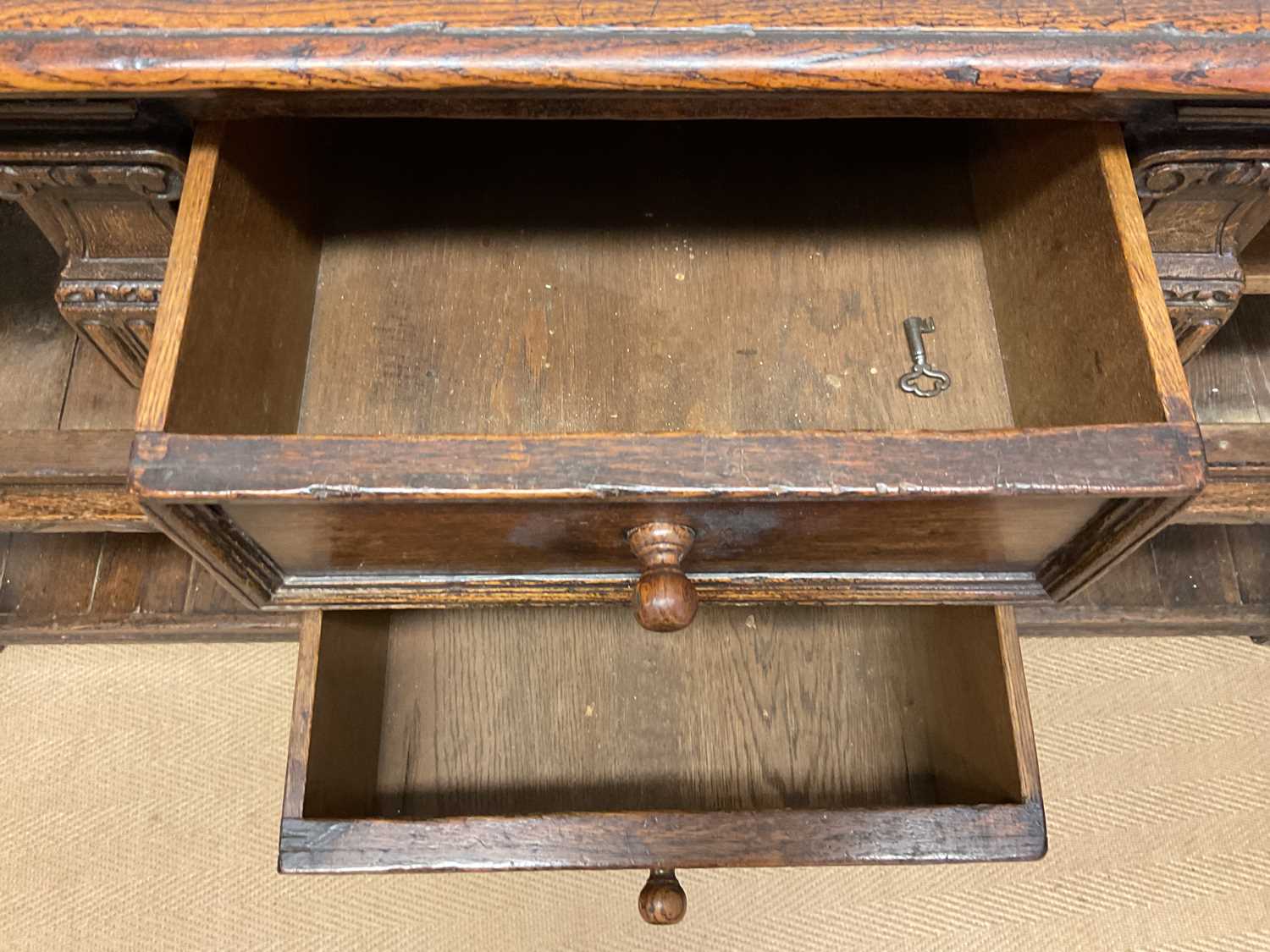 A carved oak sideboard, with two central drawers and two cupboards with lower undertier, height - Image 3 of 3