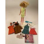 PALITOY; a Tressy doll and accessories, to include dresses, clothing, and other items, with a