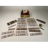 A collection late 19th early 20th century apothecary glass plate labels and other items to