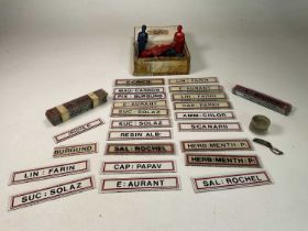 A collection late 19th early 20th century apothecary glass plate labels and other items to