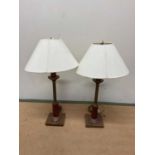 A pair of brass and wooden table lamps, height 76 cm, base 15cm square.