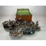 A quantity of plated wares including a tin box of cutlery and other items