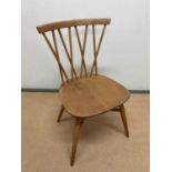 ERCOL; a candle stick dining chair, height 79cm. Condition Report: There is no damage and the joints