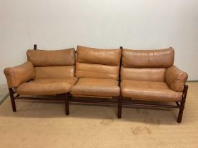 ARNE NORELL; a mid 20th century Swedish leather Kontiki three seat sofa, height at the back 76cm,