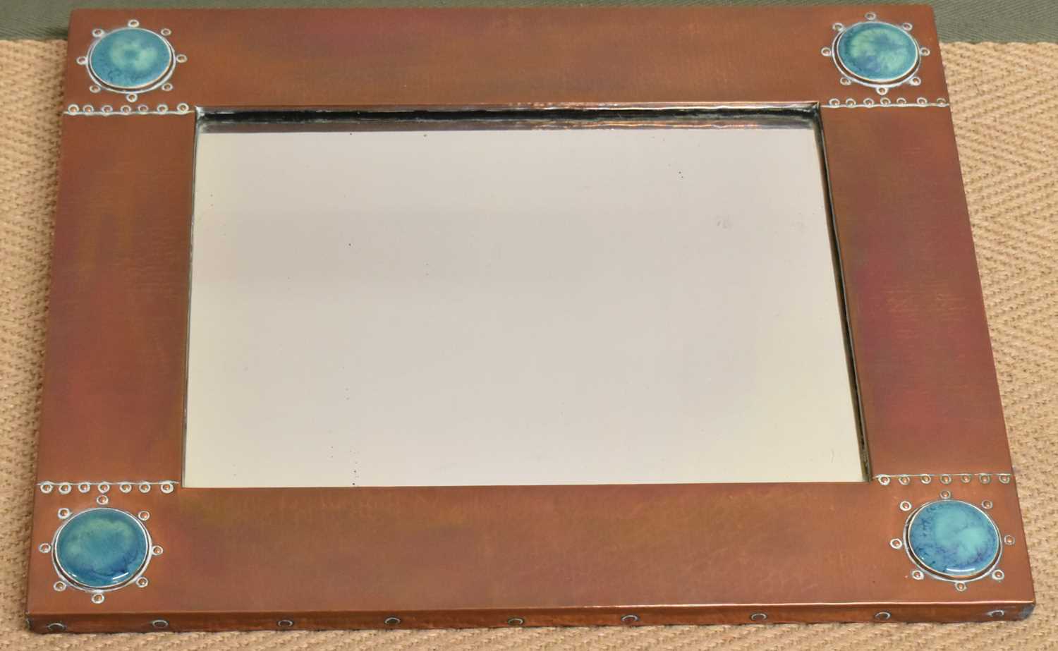 LIBERTY; an Arts and Crafts hammered copper rectangular wall mirror set with four Ruskin type - Image 7 of 7