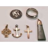 Three 9ct yellow gold pendants; one anchor and two in the form of a cross, combined approx 4.2g,