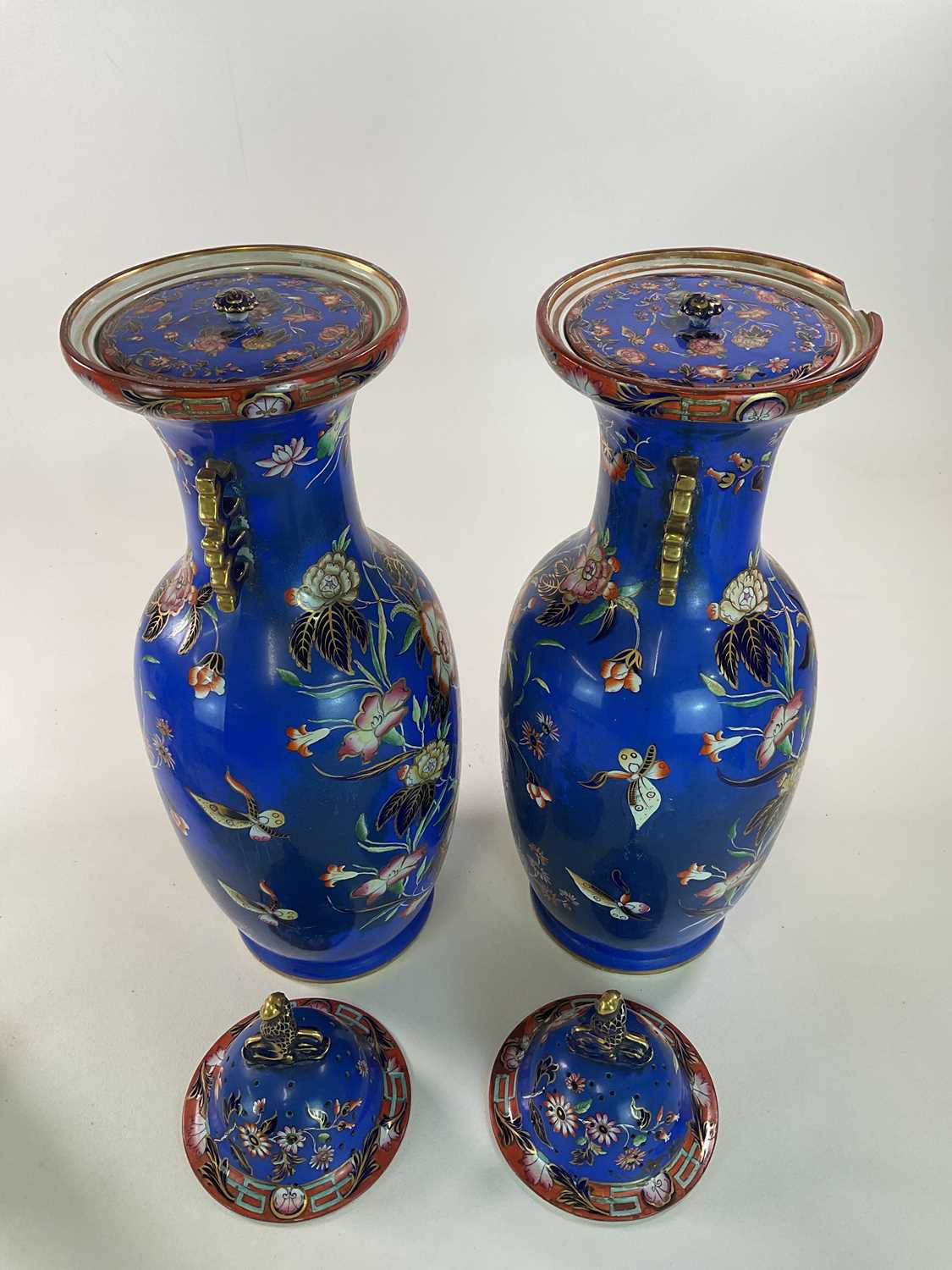 A very large pair of mid 19th century blue ground vases in the Chinoiserie style with stylised - Image 6 of 7
