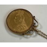 A Victorian full sovereign, 1890, in pendant swivel loop mount and suspended on a 9ct fine link