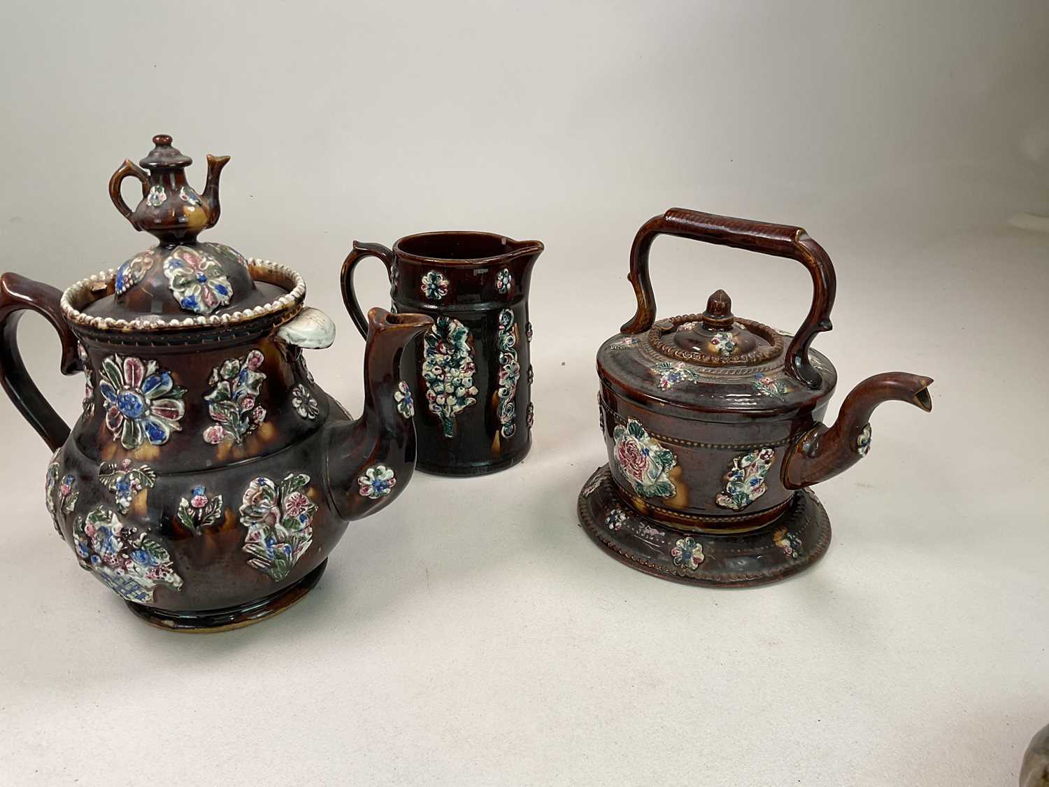 BARGEWARE; a glazed teapot, kettle on stand and jug of large proportions, height of teapot 32cm. - Image 2 of 3