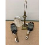 A brass table lamp and two converted carriage lamps, table lamp height 45cm.