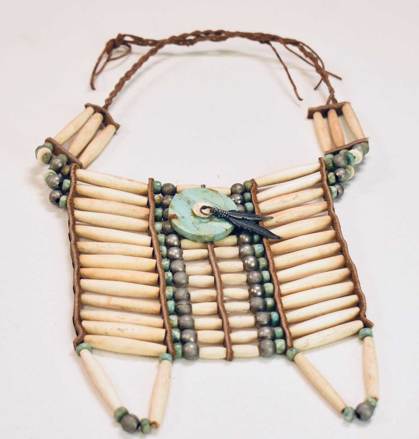 NAVAJO/NATIVE AMERICAN; a bone white metal and turquoise neckpiece, two carved bone necklaces, one - Image 2 of 4