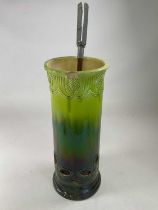 BURMANTOFTS; a green glazed stick stand, impressed marks, height 64cm, also a shooting stick (2).
