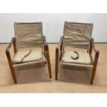 KAARE KLINT FOR CARL HANSEN & SON; a pair of mid 20th century Safari chairs, constructed of canvas