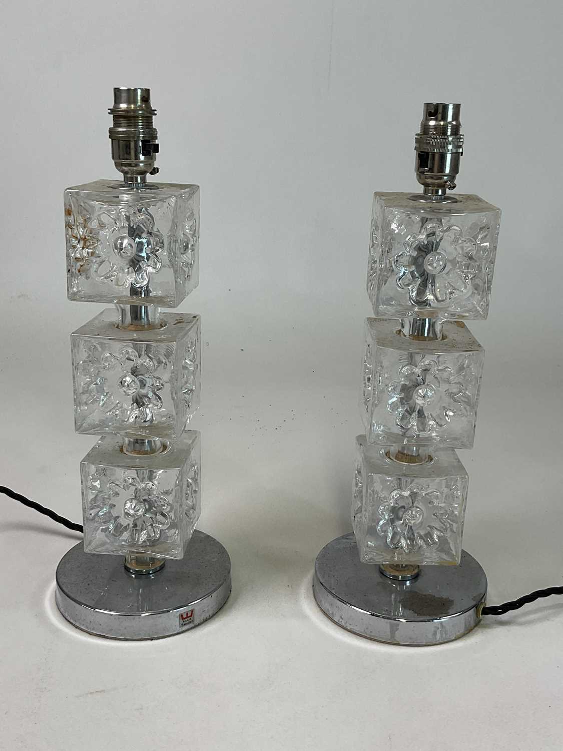 KOSTA; a pair of mid 20th century Swedish art glass table lamps, height 38cm.