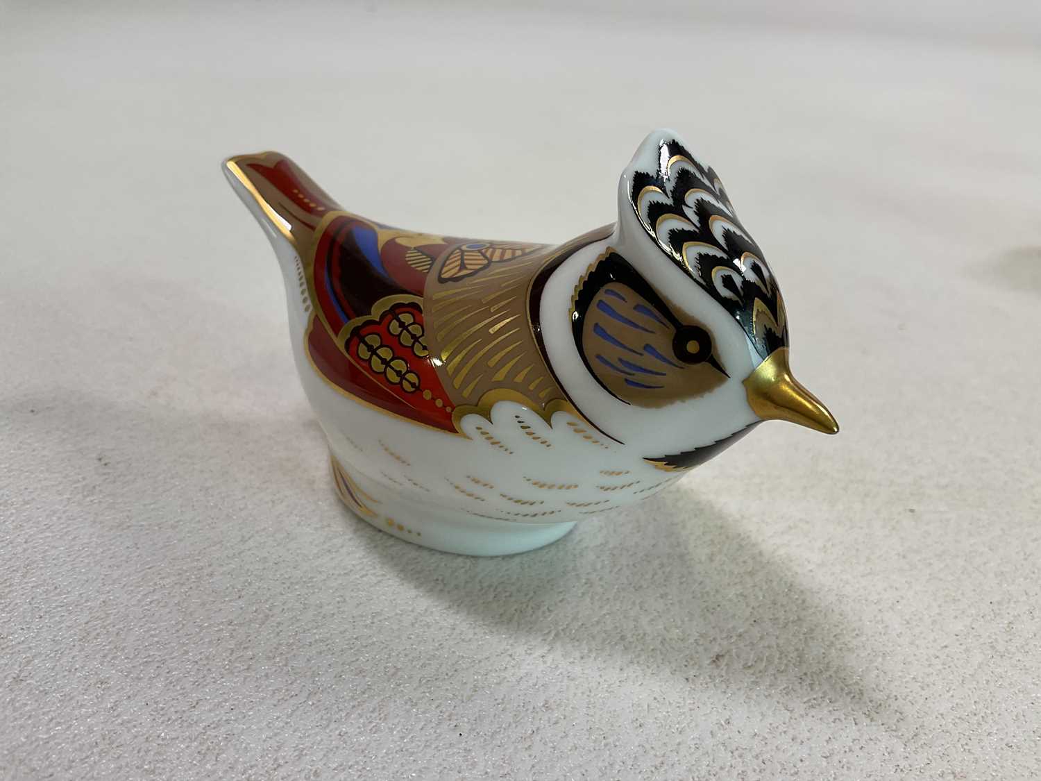 ROYAL CROWN DERBY; a collection of four bird paperweights including a Collectors' Guild Crested - Image 2 of 9