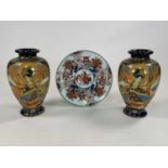 Pair of Japanese Satsuma vases, height 25cm, and an Imari style plate, diameter 24cm.