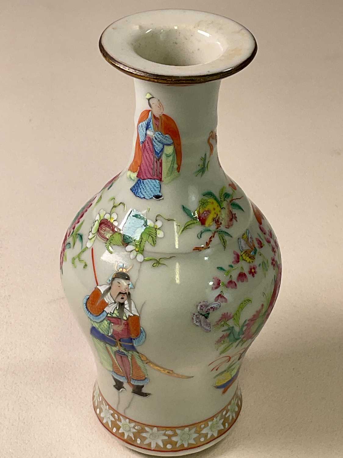 A 19th century Chinese Famille Rose baluster vase decorated with figures, floral sprays and