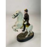 BESWICK; a Lipizzaner and rider, model 2467, Beswick black crest to oval base, height 24cm.