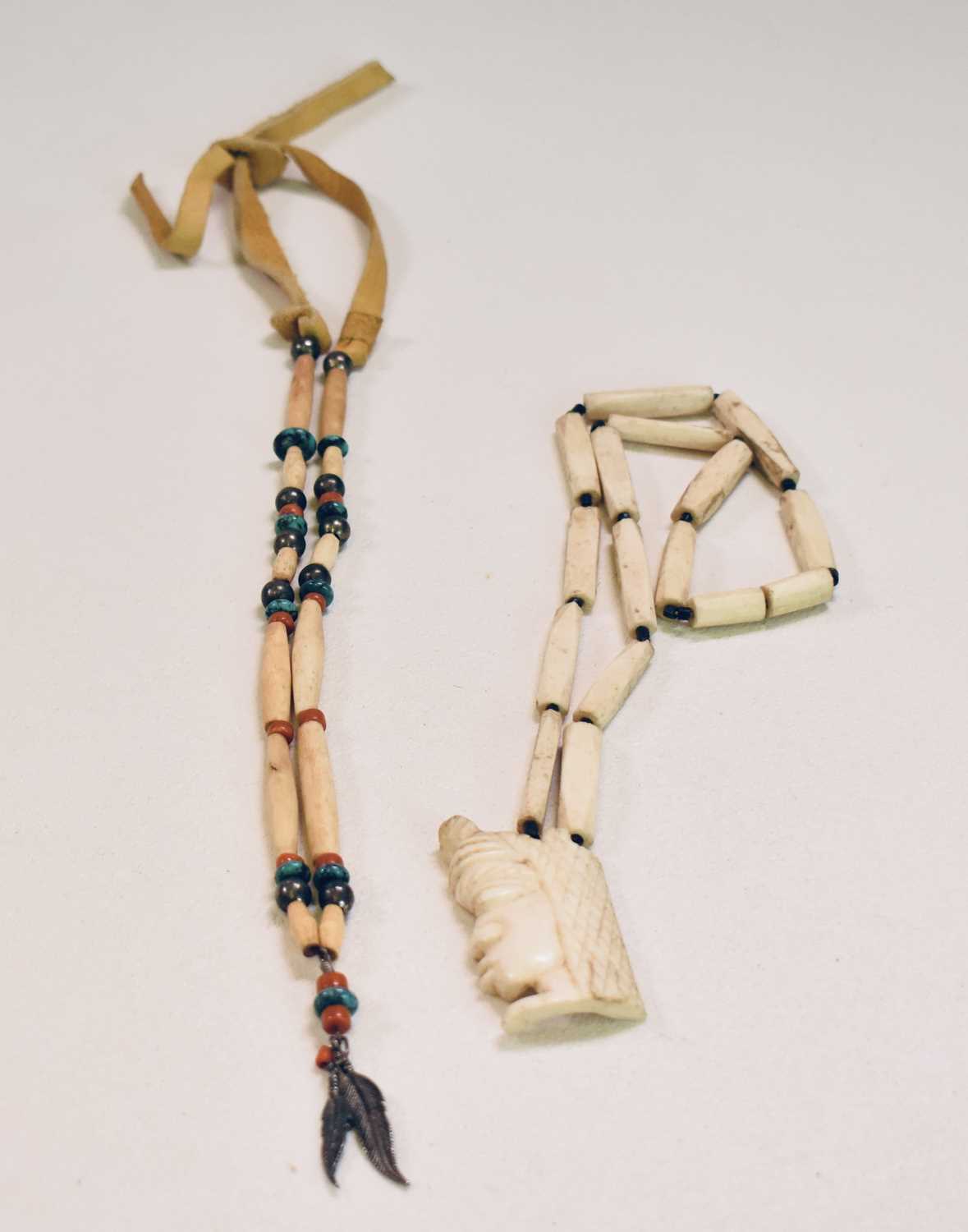 NAVAJO/NATIVE AMERICAN; a bone white metal and turquoise neckpiece, two carved bone necklaces, one - Image 4 of 4