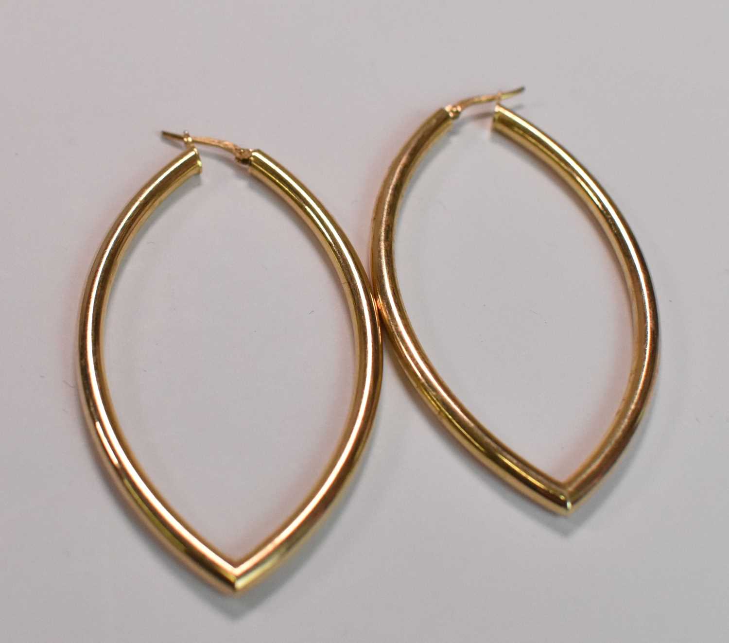 A pair of 9ct yellow gold hollow hoop earrings, combined approx 5.2g. - Image 2 of 2