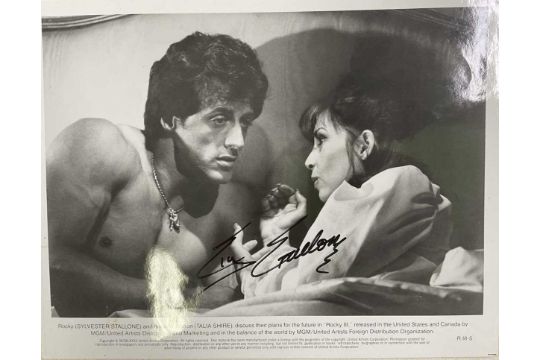 SYLVESTER STALLONE; a promotional screenshot of Rocky and his wife discussing future plans in