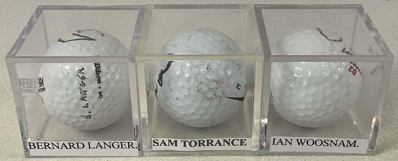 RYDER CUP LEGENDS; three golf balls signed by Sam Torrance, Bernhard Langer and Ian Woosnam, each