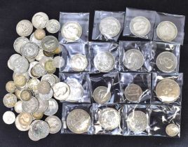 A group of silver, half silver and other, mostly UK, coins, some in plastic envelopes. Condition