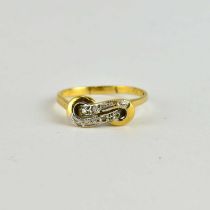 A 9ct gold ring set with tiny diamonds to the bow-shaped top, size P, approx. 2g.