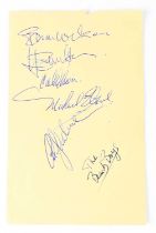 THE BEACH BOYS; a torn page from an autograph book bearing the signatures of Brian Wilson, etc, 16 x