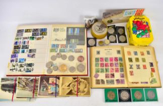 A collectors' lot comprising two stamp albums, various postcards to include Blackpool, transport,