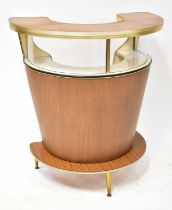 A c.1970s conical cocktail bar with curved glass section, faux wood veneer, vinyl covering and metal