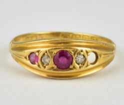 An 18ct gold 19th century diamond and ruby set ring, size N, approx. 2.7g. Condition Report: One