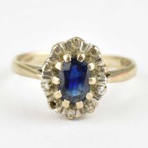 An 18ct gold diamond and sapphire cluster ring, size K, approx. 3.1g.